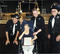 Lois Deer (center) with The Brothers & Co. members Gary Deer Jr., Gery Deer, and husband Gary Deer Sr. at the Jamestown Opera House in 2010