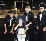 Lois Deer (center) with The Brothers & Co. members Gary Deer Jr., Gery Deer, and husband Gary Deer Sr. at the Jamestown Opera House in 2010