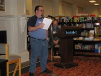 WOWA editorial committee member Bill Bicknell reads from his work at Books & Co. during last year’s “Beatnik Café” event.   Photo by Debra Bays, GLD Enterprises